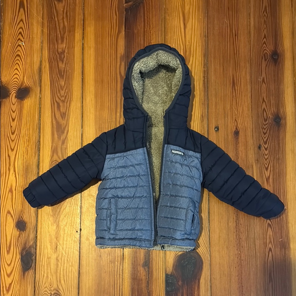 Reversible puffer/sherpa jacket